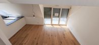 3 Zi Maisonette Penthouse mit Einbauküche WHG10 - Wohnzimmer
